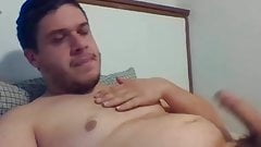 Chubby gay guy plays with his nipple