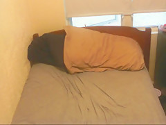 Large man jerks it into a condom